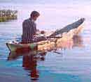 A Panamanian<BR>fishes in<BR>Lago Gatun